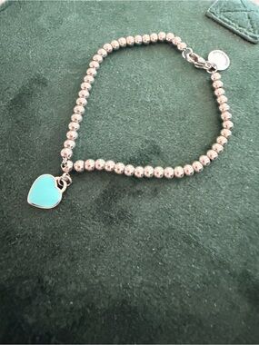 Tiffany & Co. Silver Beaded Bracelet with Blue Heart Charm